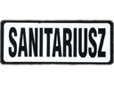Reflexný SANITÁRNY znak na suchý zips, 13 x 5 cm