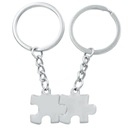 Dve strieborné puzzle kľúčenky pre páry