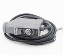 y fotoelektrický spínač baliaceho stroja
