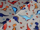 FAREBNÉ DINOSAURY SIVÁ MINKY FLEECE MIKROVLÁKNO