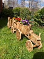 Traktor s dreveným vozíkom