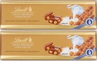 Lindt švajčiarska mliečna čokoláda lieskové oriešky 300g x2 Lindt švajčiarska mliečna čokoláda lieskové oriešky 300g x2