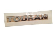 Emblém s nápisom Touran na zadných dverách VW Touran