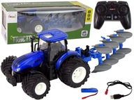 Traktor na diaľkové ovládanie 1:24 modrý pluh kovový Traktor na diaľkové ovládanie 1:24 modrý pluh kovový