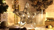 Svietiaca vianočná hviezda LED zlatý kovový 2xAA
