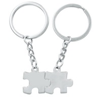 Dve strieborné puzzle kľúčenky pre páry Dve strieborné puzzle kľúčenky pre páry