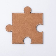 Kožená podložka v tvare hnedého puzzle
