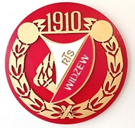 Widzew, erb osvetlený preglejkovou stenou Widzew, erb osvetlený preglejkovou stenou