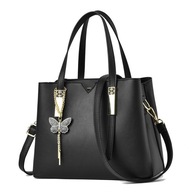 Čierna ekokožená truhlica na kabelku s motýľovou kľúčenkou