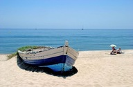 Fototapeta Stará loď na pláži, 175 x 115 cm