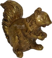 Zlatá veverička s orechom.Dekorácia.Propagácia