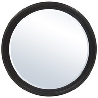 Okrúhle zrkadlo s tmavým rámom na skosený toaletný stolík