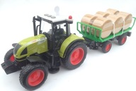 FARMÁRSKY TRAKTOR S PRÍVESOM GUĽA NA SENO FARMÁRSKY TRAKTOR S PRÍVESOM GUĽA NA SENO