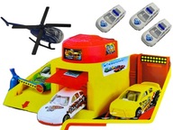 Dvojposchodová garáž, autá, helikoptéra, polícia, stráž, trať