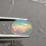 FUSIMA Opál z Etiópie Cabochon ~10,05x7,79 mm č.39 FUSIMA Opál z Etiópie Cabochon ~10,05x7,79 mm č.39