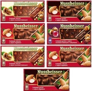Nussbeisser mliečna čokoláda s orieškami set, mix príchutí 100g x 7 ks Nussbeisser mliečna čokoláda s orieškami set, mix príchutí 100g x 7 ks